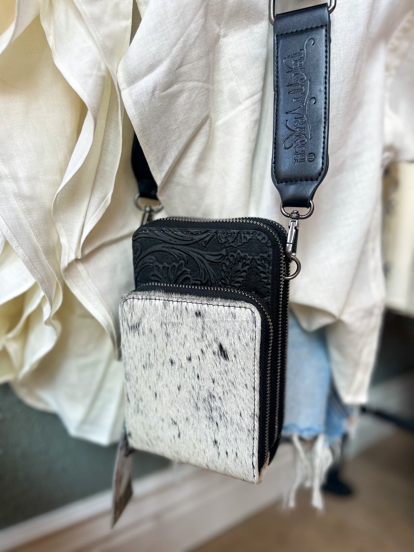 Sadler Cowhide Crossbody in Black